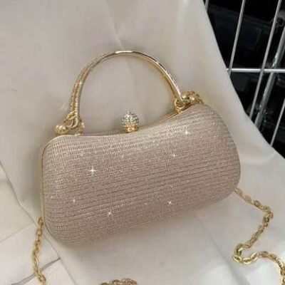 A luxurious, handmade evening bag adorned with sequins, beads, and rhinestones, featuring a leather shoulder strap and high-quality gold details. Perfect for evenings and formal events for girls, women, and bri