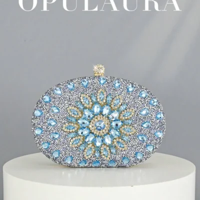 A small, luxurious women's handbag adorned with sparkling crystals; a shimmering, diamond-studded evening bag for formal occasions; an elegant bag for parties, weddings, and evenings out, complete with a chain